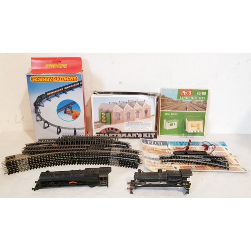 311 - A collection of 'OO' gauge engines, rolling stock, track and buildings. UK shipping £14.