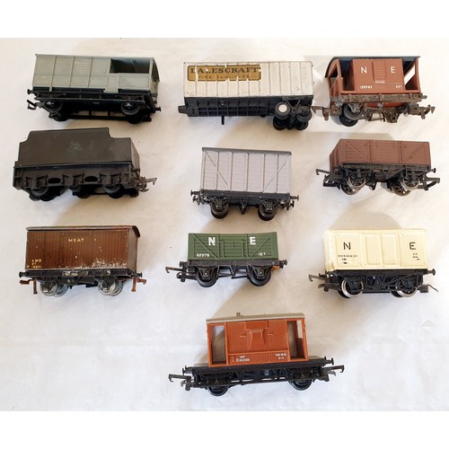 311 - A collection of 'OO' gauge engines, rolling stock, track and buildings. UK shipping £14.