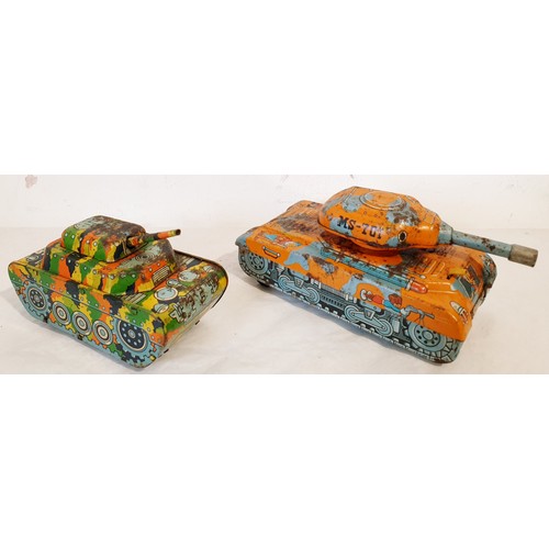 314 - A vintage tin plate clockwork MS-701 Super Tank and a push along tin plate 226 tank, both A/F. UK sh... 