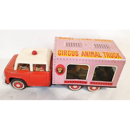 315 - A vintage tin plate push along MF782 Circus Animal Truck. UK shipping £14.