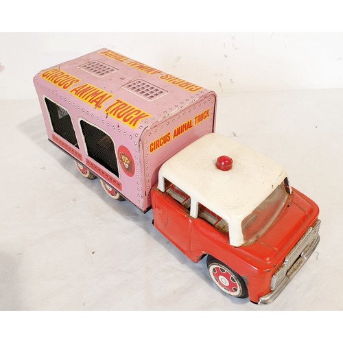 315 - A vintage tin plate push along MF782 Circus Animal Truck. UK shipping £14.