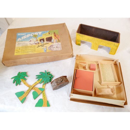 318 - Vintage boxed games and toys including a Cosmo Train Set, Trix train, track and others. UK shipping ... 