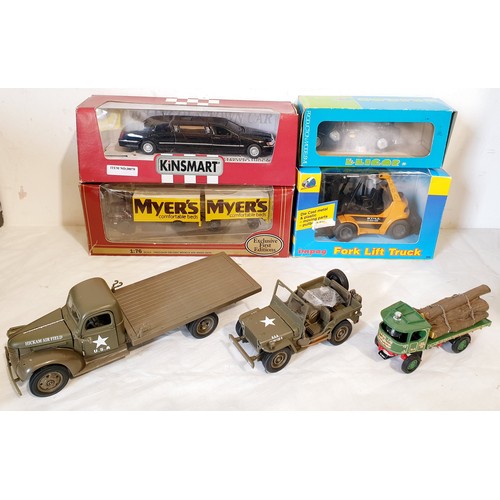 319 - Nine boxed die-cast vehicles including a Maisto Jaguar XK180 and two loose US Army die-cast vehicles... 