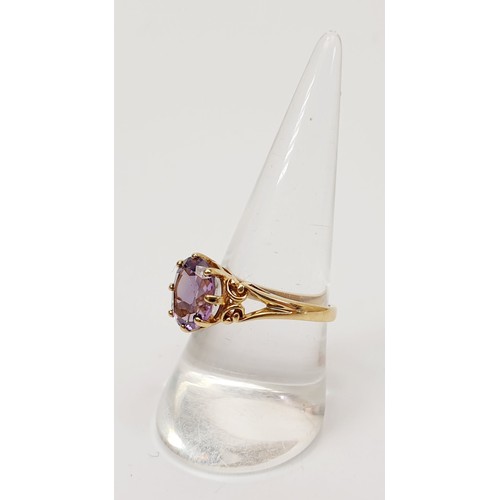 7 - A hallmarked 9ct gold and amethyst ring, gross weight 3g, size R. UK shipping £14.