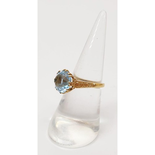 11 - A hallmarked 9ct gold and topaz ring, gross weight 3.2g, size L/M. UK shipping £14.