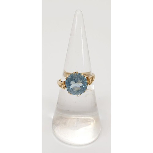 11 - A hallmarked 9ct gold and topaz ring, gross weight 3.2g, size L/M. UK shipping £14.