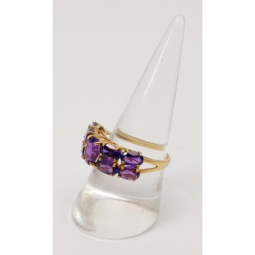 12 - A 9ct gold ring set with amethyst, gross weight 3g, size Q/R. UK shipping £14.