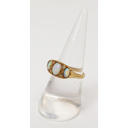 19 - A hallmarked 9ct gold diamond and opal ring, gross weight 2.6g, size N/O. UK shipping £14.