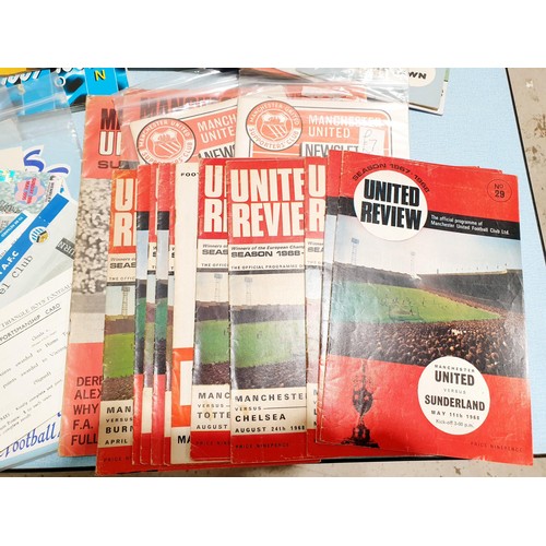 63 - A selection of programmes and ephemera relating to Manchester United, Huddersfield Town and other fo... 