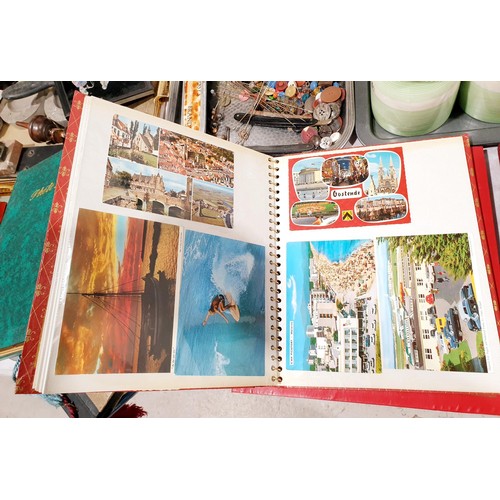 67 - A selection of six postcard and photograph albums. UK shipping £14.