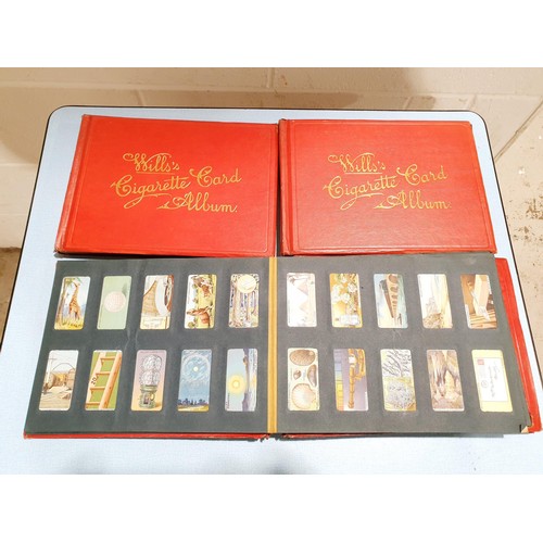 69 - A selection of cigarette card albums. UK shipping £14.