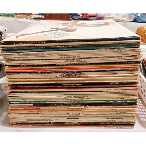 79 - A selection of vinyl LPs and 7