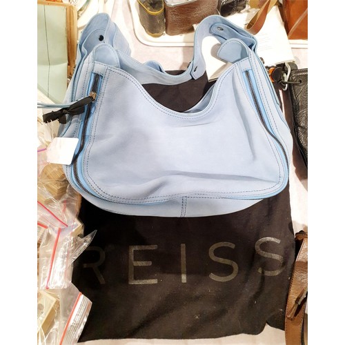 125 - An unused Reiss leather handbag. UK shipping £14.