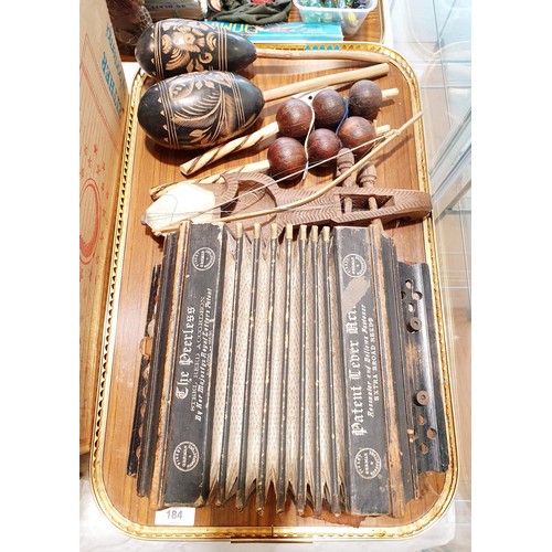 184 - Two trays of wooden musical instruments and a Peerless accordion which is A/F. No shipping. Arrange ... 