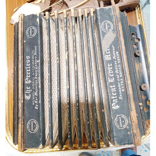 184 - Two trays of wooden musical instruments and a Peerless accordion which is A/F. No shipping. Arrange ... 