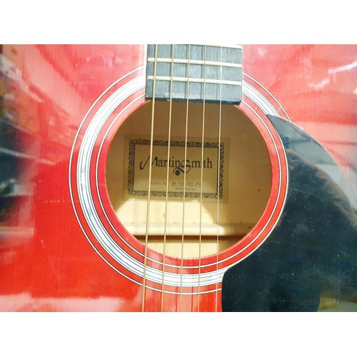 197 - A Martin Smith W-100-RD-PK acoustic guitar. No shipping. Arrange collection or your own packer and s... 