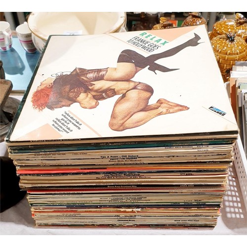 79 - A selection of vinyl LPs and 7