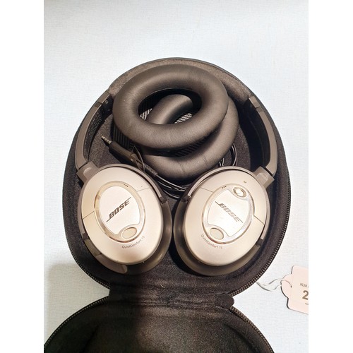 213 - A pair of wired Bose QuietComfort 15 Acoustic Noise Cancelling headphones with new unused ear foam. ... 