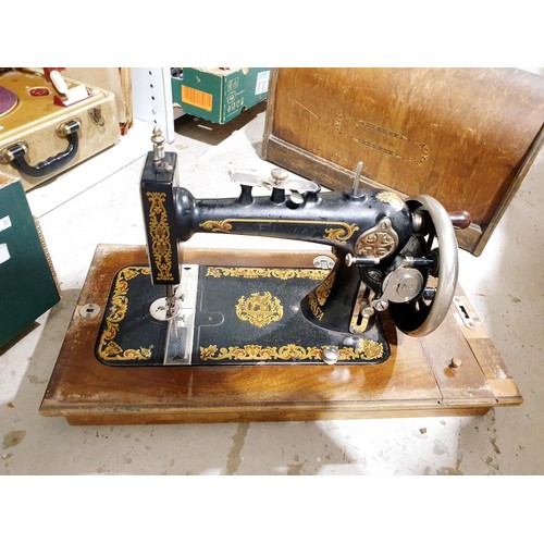 220 - A vintage Singer sewing machine. No shipping. Arrange collection or your own packer and shipper, ple... 