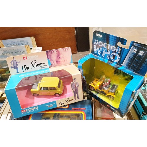 238 - A selection of boxed model vehicles including Corgi Dr Who and Mr Bean's Mini. UK shipping £14.