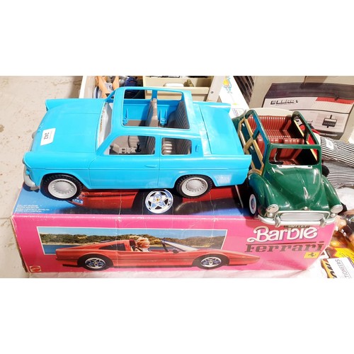 242 - A vintage Barbie's Ferrari box (no car) together with Ron Weasley's Ford Anglia and a Sylvanian Fami... 