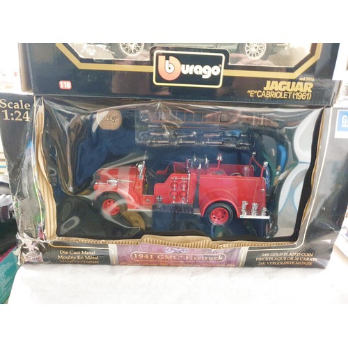 245 - A Burago Jaguar E type cabriolet model and a signature series model fire engine. UK shipping £14.