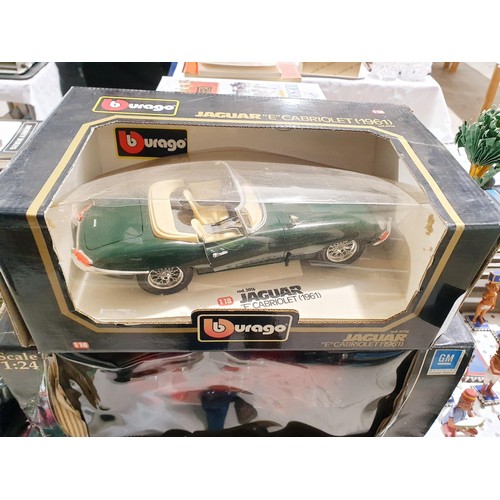 245 - A Burago Jaguar E type cabriolet model and a signature series model fire engine. UK shipping £14.