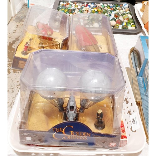 267 - Three boxed The Golden Compass vehicles. UK shipping £14.