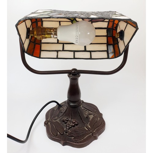 276 - A Tiffany style table lamp with metal base and butterfly motif, height 31cm. No shipping. Arrange co... 