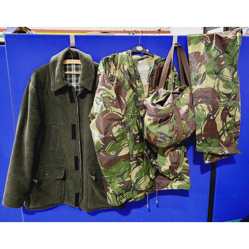 196 - A Sutcliffe Farrar Field Classics hunting coat, size L together with camouflage ware. UK shipping £1... 