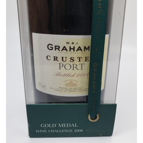 7 - A bottle of W. & J. Graham's Crusted Port 2004. No shipping. Arrange collection or your own packer a... 