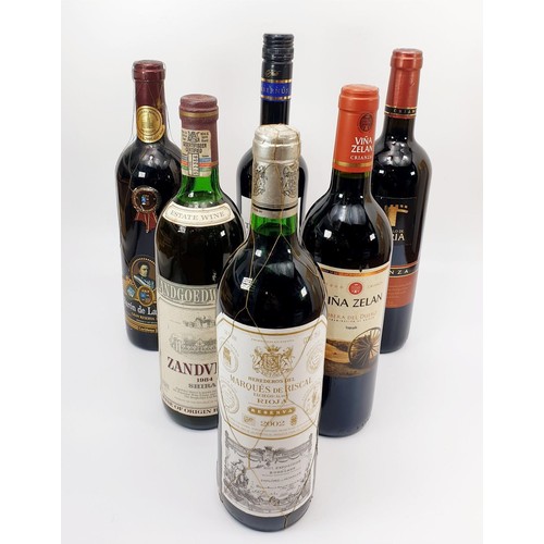 20 - Six bottles of red wine: Castillo de Liria 2004 Crianza, Vina Zelan 2000 Crianza, Villa Tabernus 200... 