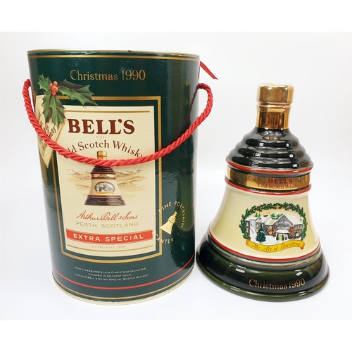 40 - Two boxed Bell's Scotch Whisky in Wade porcelain decanters for Christmas 1989 and 1990, each 75cl. N... 