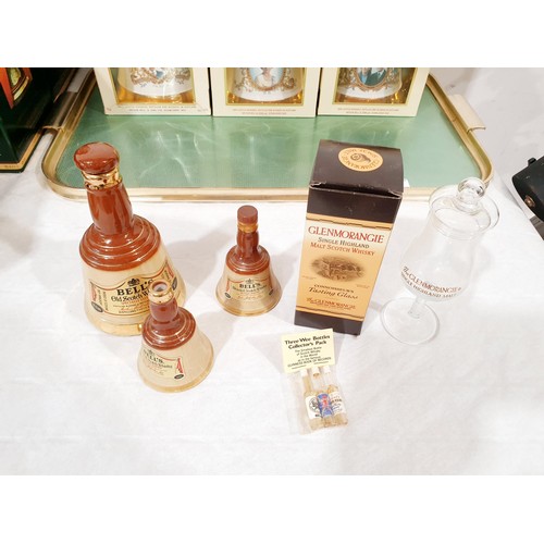 44 - A selection of empty Wade Scotch Whisky decanters and a Glenmorangie tasting glass. No shipping. Arr... 