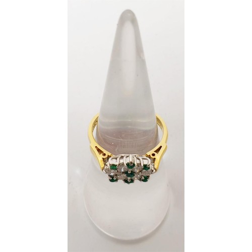 46 - A hallmarked 18ct gold emerald and diamond dress ring, gross weight 3.8g, size L. UK shipping £14.