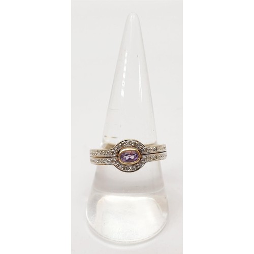 47 - A hallmarked 9ct gold diamond and purple stone ring, gross weight 4.5g, size R. UK shipping £14.