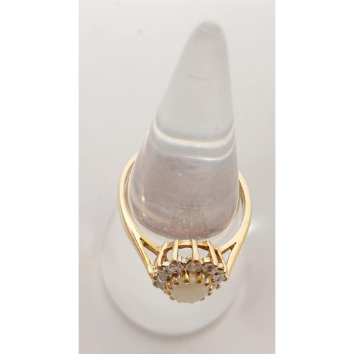 61 - A hallmarked 9ct gold opal and clear stone cluster ring, gross weight 2.2g, size O/P. UK shipping £1... 