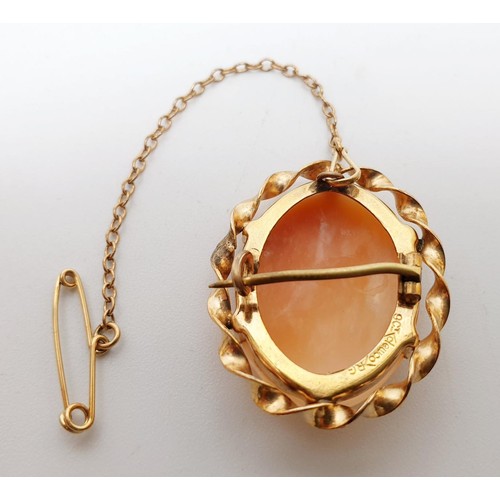 68 - A vintage cameo brooch in a rolled gold mount by E J Clewley, Birmingham, length 3cm. UK shipping £1... 