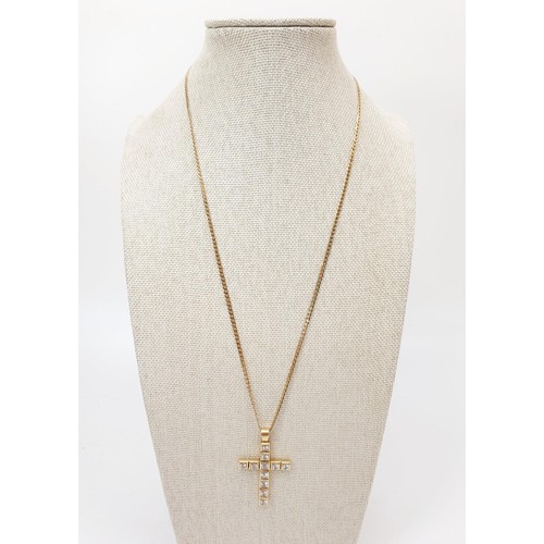 70 - A hallmarked 9ct gold cross set with cubic zirconia on a 9ct gold chain, chain length 50cm, gross we... 