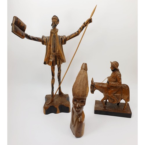 271 - Two Ouro Artesania wooden carvings depicting Don Quixote and Sancho Panza together with a wooden tri... 