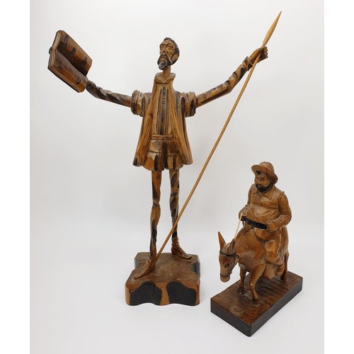 271 - Two Ouro Artesania wooden carvings depicting Don Quixote and Sancho Panza together with a wooden tri... 