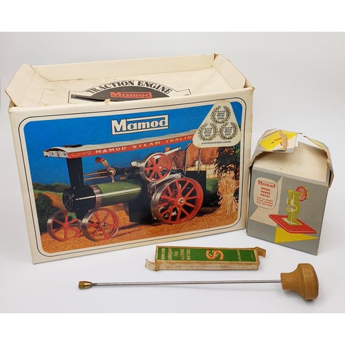 276 - A boxed Mamod TE1A traction engine with a power press accessory. UK shipping £14.