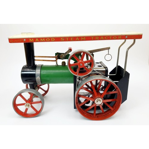 276 - A boxed Mamod TE1A traction engine with a power press accessory. UK shipping £14.