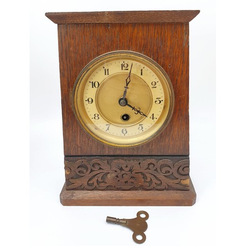 277 - An early 20th century mantel clock, height 26cm, A/F together with a table clock in a wooden barley ... 