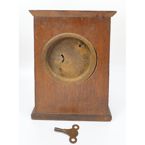 277 - An early 20th century mantel clock, height 26cm, A/F together with a table clock in a wooden barley ... 