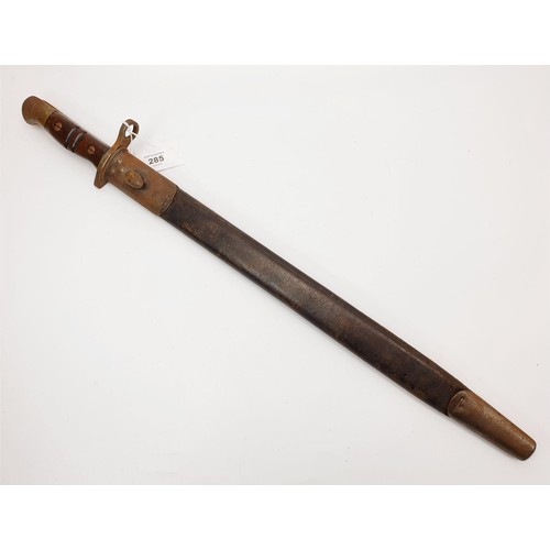 285 - An American WWI Remmington 1913 pattern bayonet with scabbard, length 55.5cm. No Shipping. Arrange c... 