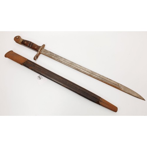 285 - An American WWI Remmington 1913 pattern bayonet with scabbard, length 55.5cm. No Shipping. Arrange c... 