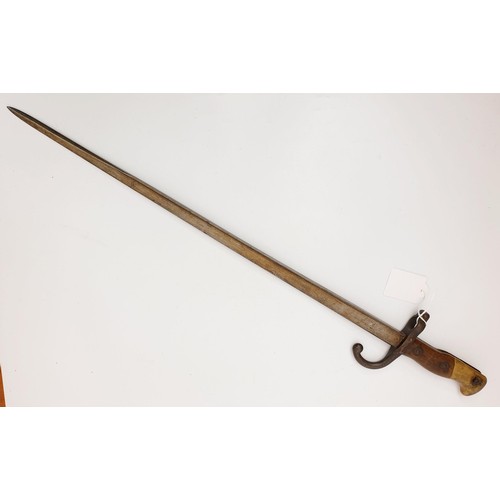 286 - A French bayonet dated 1879, length 64cm together with an antique spike bayonet. No Shipping. Arrang... 