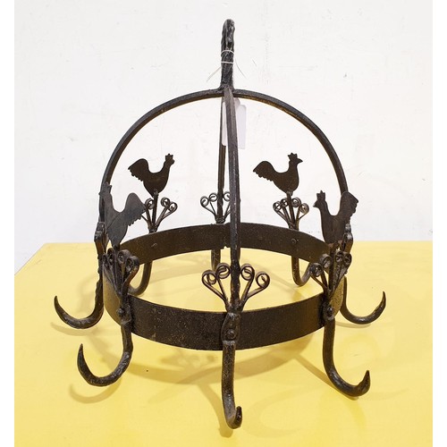 292 - A wrought iron game hanger, height 34cm. No Shipping. Arrange collection or your own packer and ship... 