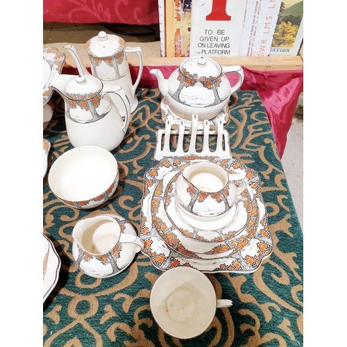 295 - A selection of Crown Ducal Orange Tree pattern tea, coffee and dinnerware, some pieces A/F. No Shipp... 